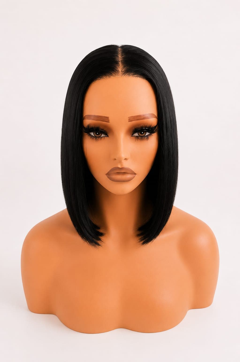 Black woman wearing Tori Natural Black wig
